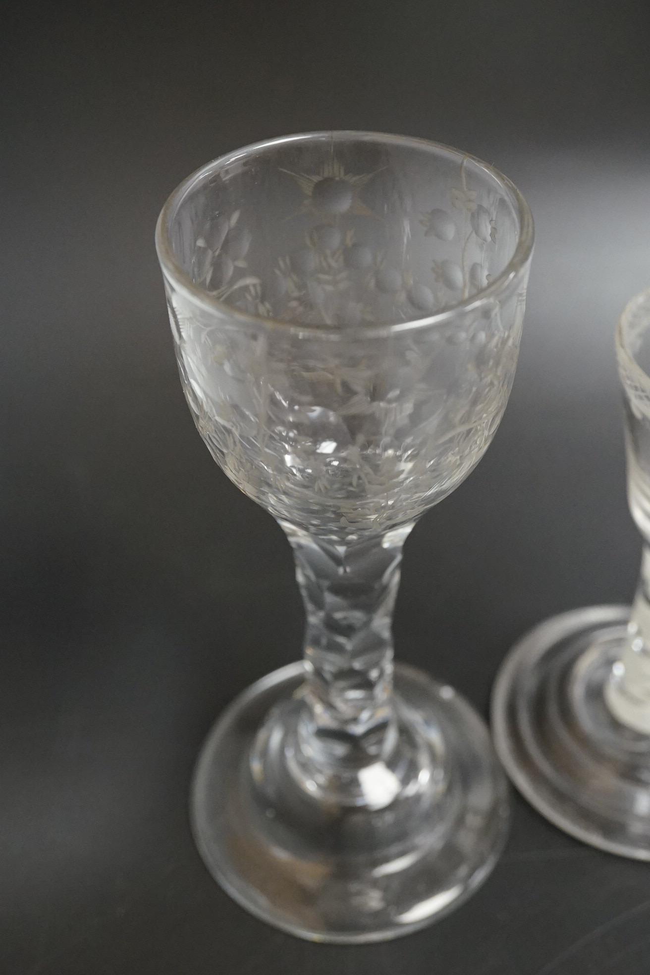 An opaque twist firing glass with terraced foot and a faceted wine glass with domed foot, c.1760, tallest 14cm